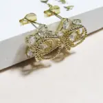 brinco zirconias entrelaçado ouro